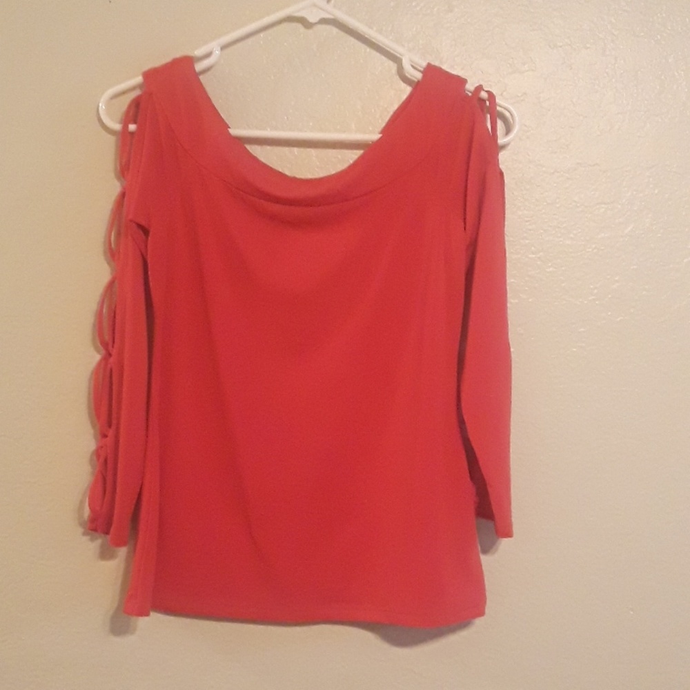 Beautiful red shirt with criss cross sleeves